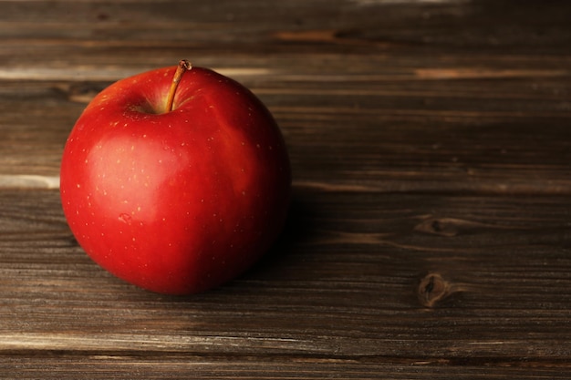 Apple on wooden background