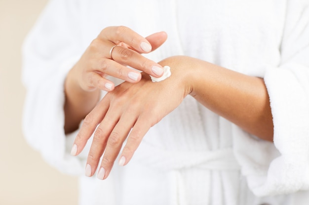 Applying Hand Cream Closeup