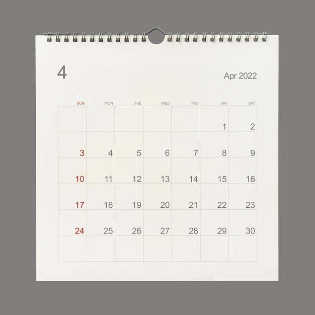 April 2022 calendar page on white background. Calendar background for reminder, business planning, appointment meeting and event. Close-up.