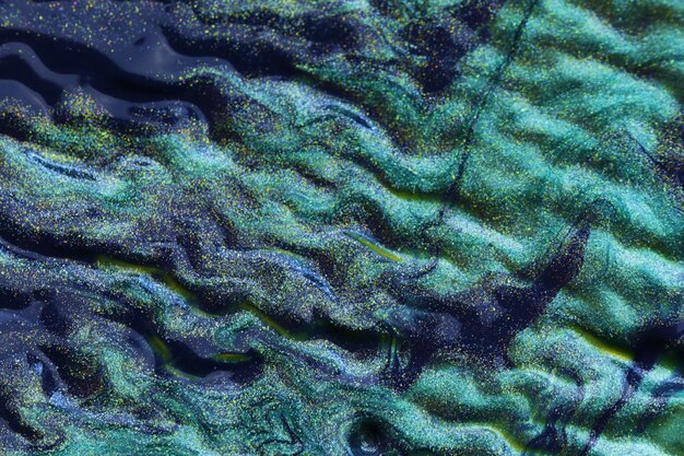 Aqua Menthe waves texture. Turquoise glitter background. Blue-green macro texture