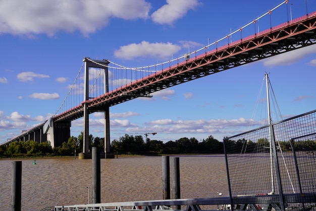 The Aquitaine bridge across river Garonne in bordeaux France view from coast