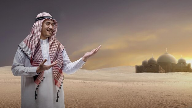 Arab man wearing keffiyeh showing something on his hand