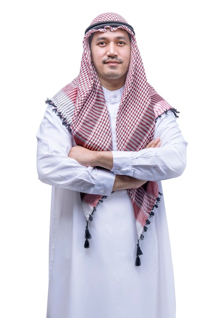 Arab man wearing keffiyeh standing with folded arms