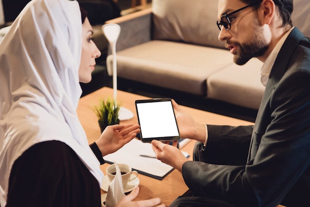 Arab woman at reception with psychologist