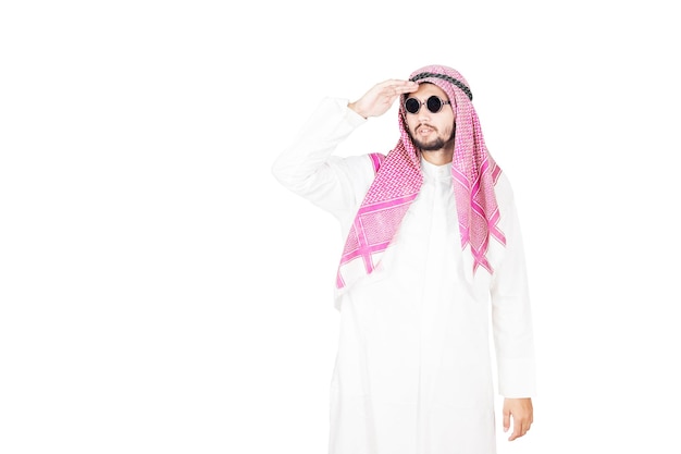 Arabian businessman looking far away on studio