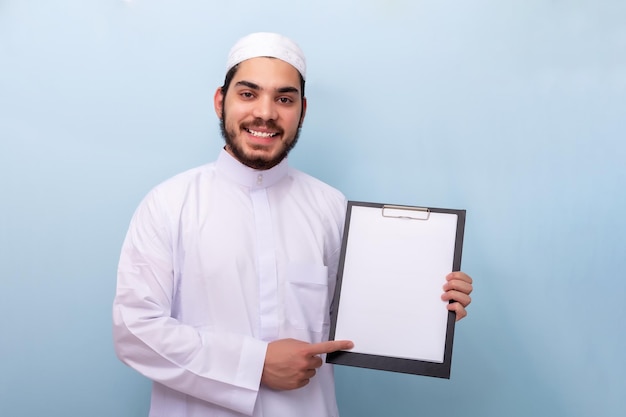 Arabian muslim man with beard and traditional outfit