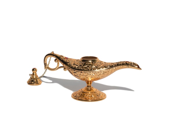 Arabian old oil lamp isolated on white background magical mysterious aladdin lamp