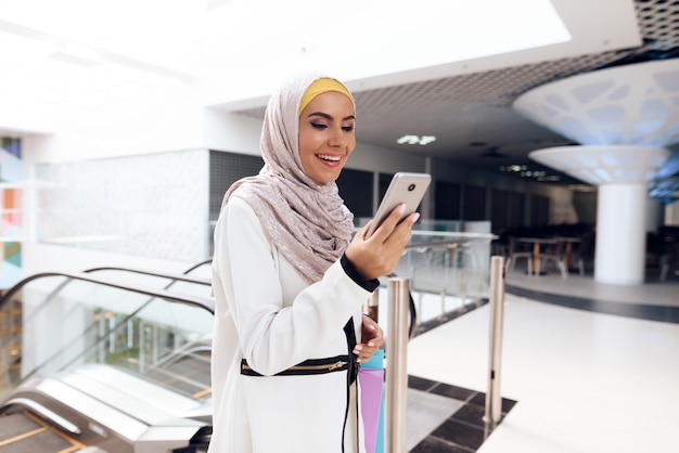 Arabian Woman Using Smartphone on Shopping.