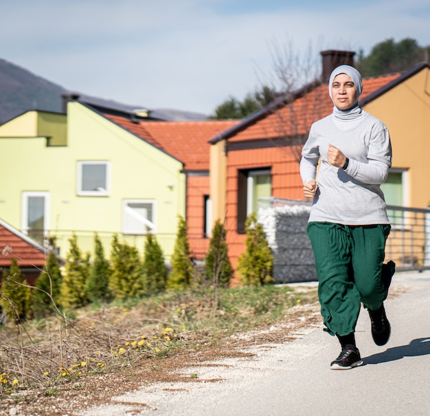 Arabic Adult Woman Running in Nature