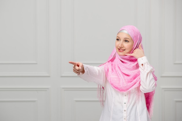 Arabic girl lovely cute young muslim woman covered in beautiful pink hijab