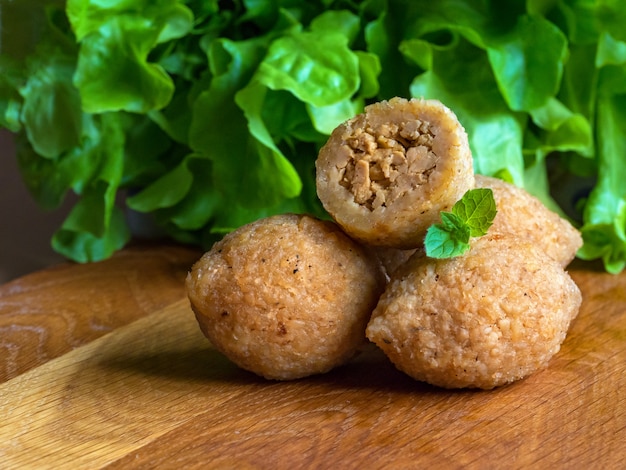 Arabic meat appetizer Kibbeh. Traditional Arabic kibbeh with lamb and pine nuts.