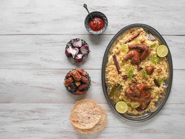 Arabic traditional food bowls Kabsa with meat