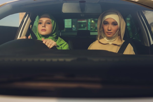 Arabic young Woman Couple Traveling By Car