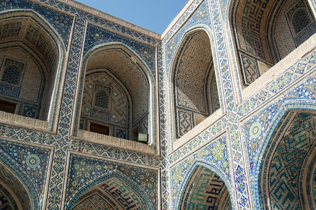 The arch and the exterior design of the ancient Registan in Samarkand Ancient architecture of Asia