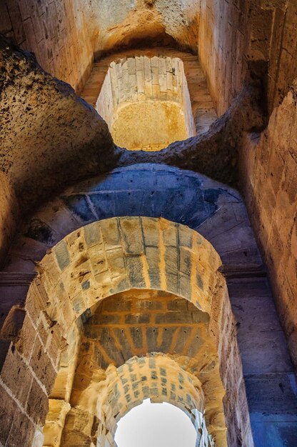 Arch in ruins of the largest coliseum North Africa El JemTunisia UNESCO