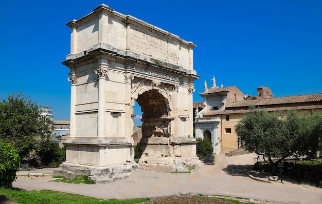 The Arch of Titus is a 1stcentury honorific arch located on the Via Sacra Rome Italy