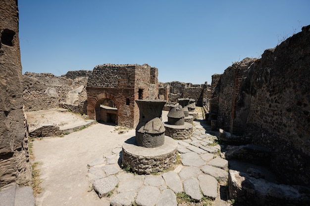 Archaeological ruin of ancient Roman city Pompeii was destroyed by eruption of Vesuvius volcano nearby city in Pompeii Campania region Italy