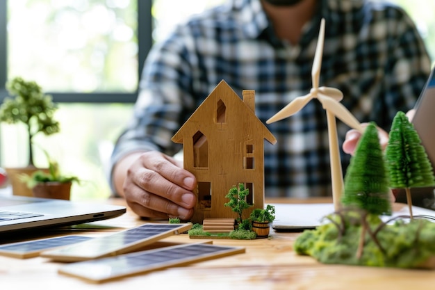 Architect designer hold small wooden house symbol while thinking about home design Generative AI