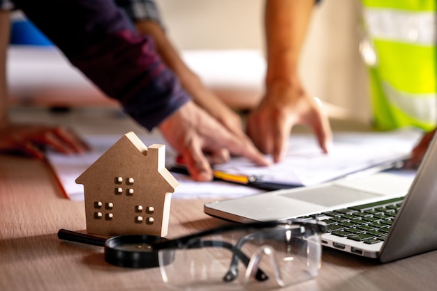 Architect and engineer checking documents