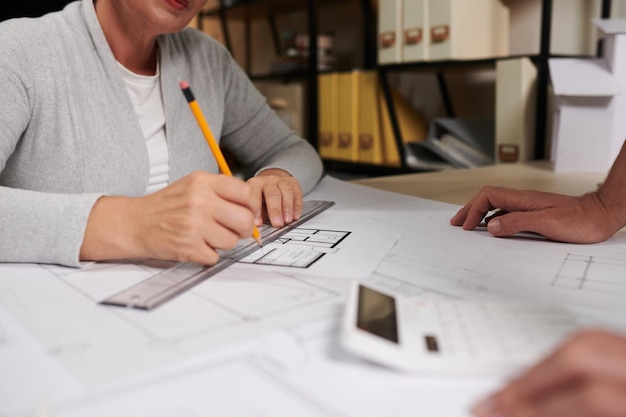 Architect Measuring Wall Length