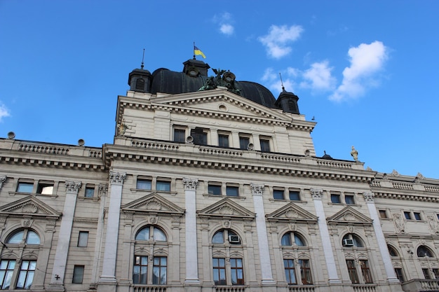 Architectural ensemble of great building with white columns in Lvov