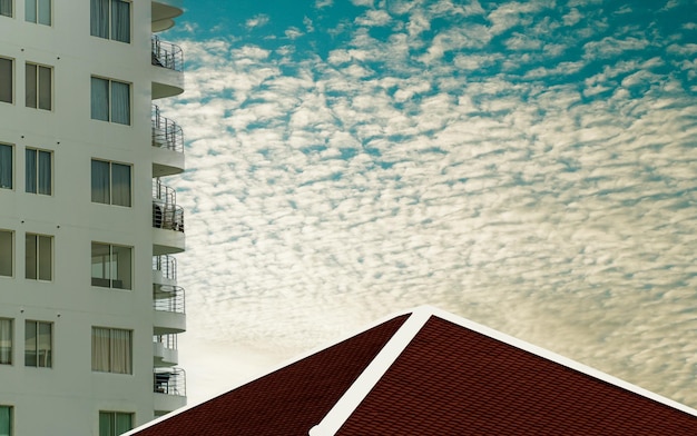 Architecture background of external white modern building against blue sky in perspective side view and vertical frame