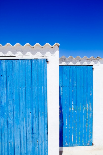 architecture balearic islands white blue doors detail