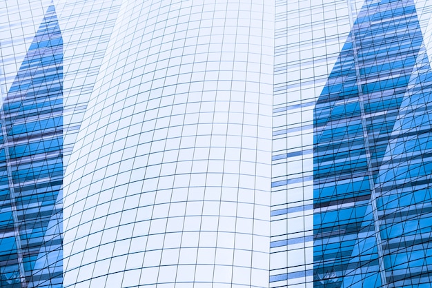 Architecture close up, windows of skyscraper. Glass and concrete. City Business District.