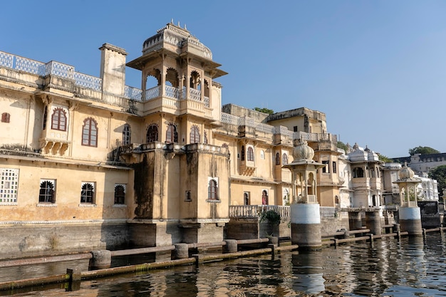 Architecture decorated facade near water lake in Udaipur Rajasthan India