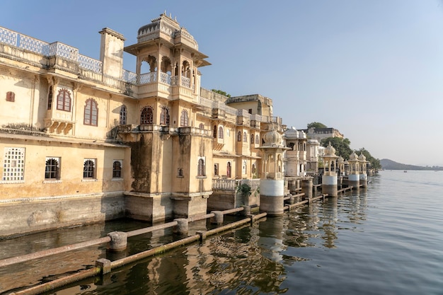 Architecture decorated facade near water lake in Udaipur Rajasthan India