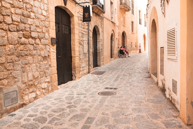 The architecture of the island of Ibiza A charming empty white street in the old town of Eivissa