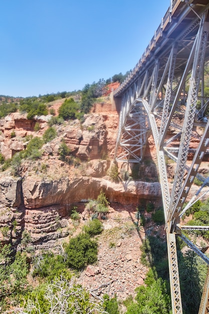 Arizona rocky mountains with large steel bridge