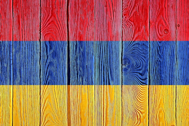 Armenia flag painted on old wood plank background Brushed natural light knotted wooden board texture Wooden texture background flag of Armenia