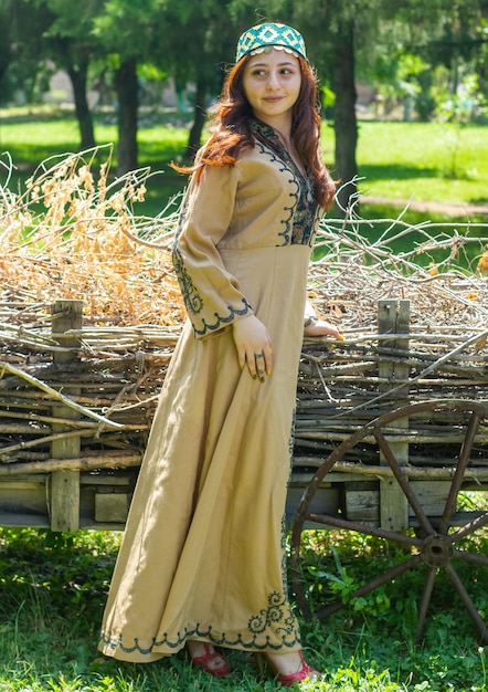 Armenian young woman in traditional clothes in the park woman with traditionnal clothes