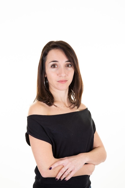 Arms crossed business woman posing isolated over white wall background