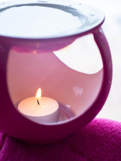 Aromatherapy pink oil burners selective focus spa concept