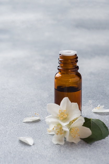 Aromatherapy with jasmine oil. Jasmine flowers.