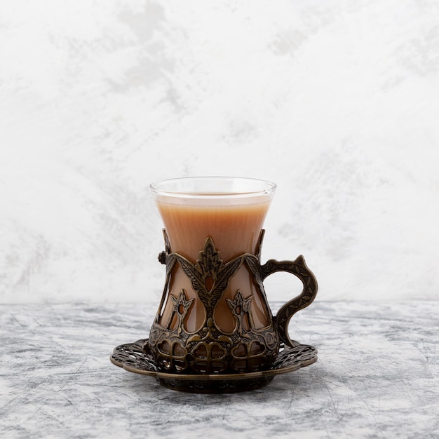 Aromatic ginger tea with the addition of milk variety of spices and spices Warming drink.