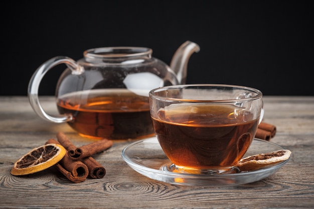 aromatic hot cinnamon tea on wooden table