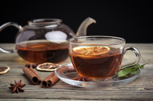 aromatic hot cinnamon tea on wooden table