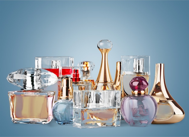 Aromatic Perfume bottles on background