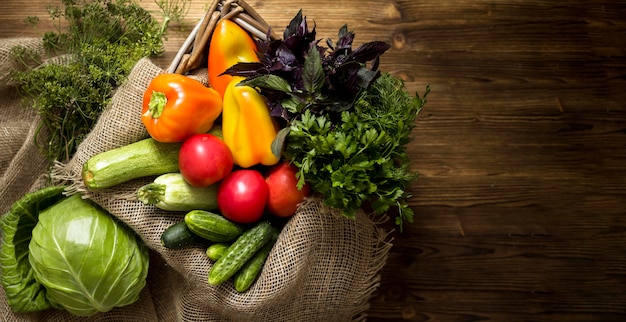 Arrangement of fresh autumnal vegetables with copy space