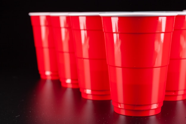 The arrangement of red plastic cups for game of beer pong