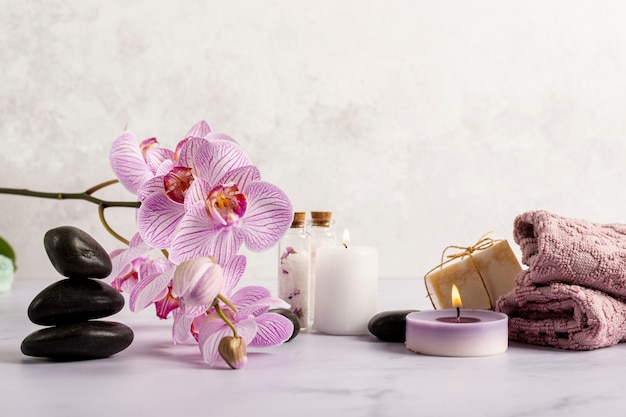 Arrangement with spa flowers and candles