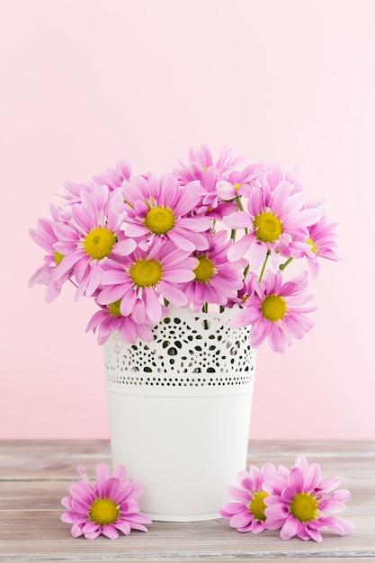 Photo arrangement with spring flowers in white vase