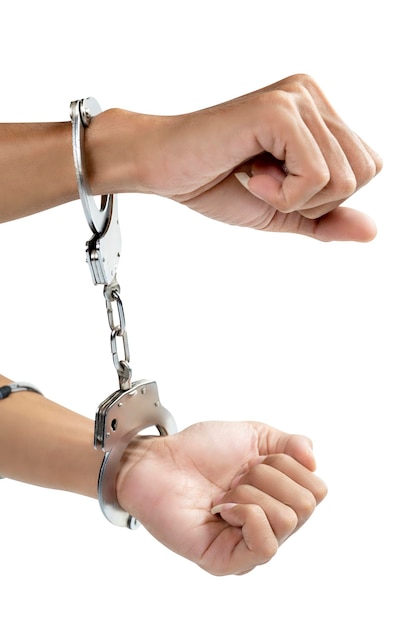 Arrested man with a handcuff on his hand