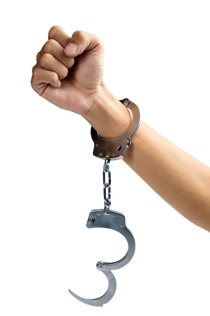 Arrested man with a handcuff on his hand