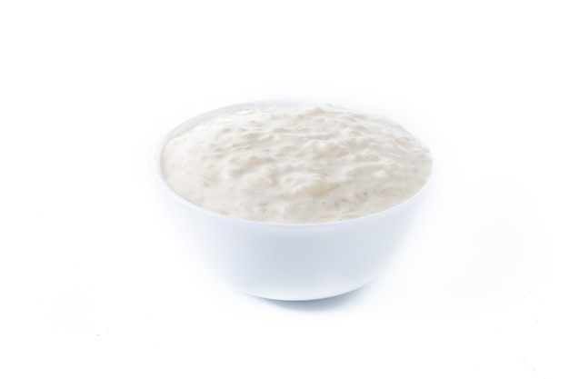 Arroz con leche Rice pudding with cinnamon isolated on white background