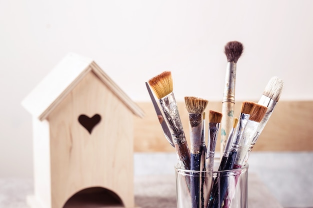 Art Brush Set and wooden house for decoration.