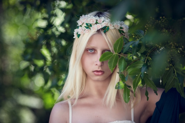 Art portrait of beautiful lonely albino girl. Pretty woman posing in town and looking at you. Shallow DOF